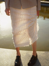 напівпрозора міді-спідниця